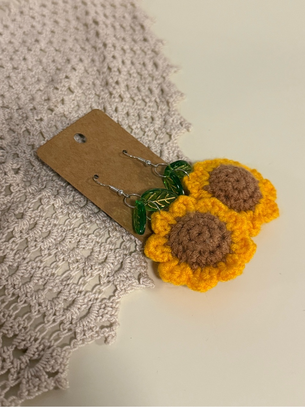 Handmade Yellow Sunflower Crochet Earrings with Green Leaf Accent